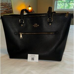 Black COACH Tote with gold hardware